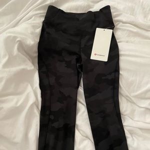 Black camo Lululemon leggings size 2 with tag attached.